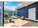 Inviting outdoor patio area with modern furniture, perfect for enjoying the fresh air and outdoor gatherings at 12874 Tradd St, Carmel, IN 46032