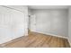 Bedroom featuring light grey walls and light-toned wood flooring at 1648 Ringgold Ave, Indianapolis, IN 46203