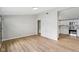 Open-concept living area with modern wood floors, neutral paint, and great natural light flow at 1648 Ringgold Ave, Indianapolis, IN 46203