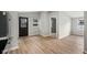 Updated open-concept living space featuring sleek floors, fresh paint, and easy access to kitchen at 1648 Ringgold Ave, Indianapolis, IN 46203
