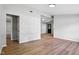 Spacious living area boasts fresh paint, updated flooring, and an open layout to other rooms at 1648 Ringgold Ave, Indianapolis, IN 46203