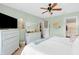 Charming bedroom with painted furniture, ceiling fan, and cozy decor at 1912 Blue Pine Ln, Indianapolis, IN 46231