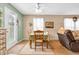 Bright dining room with a ceiling fan and natural light, perfect for Gathering dinners and entertaining guests at 1912 Blue Pine Ln, Indianapolis, IN 46231