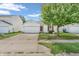 Inviting single-story home with attached garage and well-maintained front yard at 1912 Blue Pine Ln, Indianapolis, IN 46231