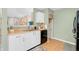 Well-lit kitchen with ample counter space, modern appliances, and storage, designed for convenient meal preparation and organization at 1912 Blue Pine Ln, Indianapolis, IN 46231