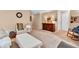 Spacious living room with warm carpet and classic decor offers a comfortable and inviting space for relaxation and entertainment at 1912 Blue Pine Ln, Indianapolis, IN 46231