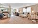Inviting living room with a comfortable seating area, complemented by natural light and stylish decor at 1912 Blue Pine Ln, Indianapolis, IN 46231
