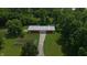 Aerial view of the barn with garden, concrete path, and manicured lawns at 2000 Hawthorne Dr, Plainfield, IN 46168