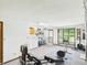 Basement featuring a laundry area, exercise equipment, and walkout access to the outdoors at 2000 Hawthorne Dr, Plainfield, IN 46168
