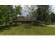 Charming home with well-manicured lawn, mature trees, and a serene setting at 2000 Hawthorne Dr, Plainfield, IN 46168