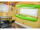 Finished basement includes a bar, kayaks hung from the ceiling, and nautical decor at 206 Olive St, Arcadia, IN 46030