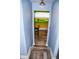 Basement access with decorative stairs leading to storage area at 206 Olive St, Arcadia, IN 46030