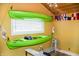 Finished basement includes nautical decor and kayaks hung from the ceiling at 206 Olive St, Arcadia, IN 46030