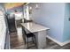 Charming kitchen featuring gray cabinets, stainless appliances, and a butcher block countertop at 206 Olive St, Arcadia, IN 46030