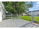 This serene back deck offers a peaceful outdoor escape overlooking the well-maintained backyard at 212 N 13Th St, Elwood, IN 46036