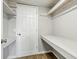 Spacious closet with built-in shelving and a convenient work surface for storage and organization at 212 N 13Th St, Elwood, IN 46036