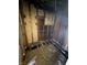 Bathroom in poor condition, with exposed framing and missing fixtures at 2215 Noble St, Anderson, IN 46016