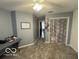 Well-lit bedroom with large closet, perfect for a guest room or space at 2230 Cedarmill Dr, Franklin, IN 46131