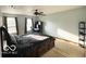 Light-filled bedroom with ceiling fan, offering plenty of room and great light for comfort and living at 2230 Cedarmill Dr, Franklin, IN 46131
