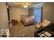 Bright bedroom features a ceiling fan and neutral carpeting for a cozy feel at 2230 Cedarmill Dr, Franklin, IN 46131