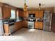 Functional kitchen with stainless steel appliances, ample cabinet space, and good lighting at 2230 Cedarmill Dr, Franklin, IN 46131