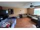 A spacious living room is showcased with a large sectional sofa and ample natural light at 2230 Cedarmill Dr, Franklin, IN 46131