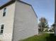 Another side view showcasing the home's structure and landscaping features at 2230 Cedarmill Dr, Franklin, IN 46131