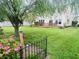 Expansive backyard featuring a wooden deck and lush lawn, perfect for outdoor enjoyment at 2292 Hampton Dr, Franklin, IN 46131