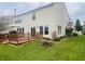Spacious backyard view with a wooden deck, ideal for entertaining or relaxing outdoors at 2292 Hampton Dr, Franklin, IN 46131