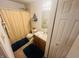 Modest bathroom with a single vanity, standard toilet, and bathtub with a neutral-colored shower curtain at 2292 Hampton Dr, Franklin, IN 46131