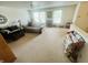 Upstairs living room with a ceiling fan, plush seating, and ample space for relaxation and recreation at 2292 Hampton Dr, Franklin, IN 46131