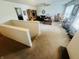 Large living room features a staircase, plush carpeting, and comfortable seating areas at 2292 Hampton Dr, Franklin, IN 46131