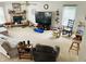 Spacious living area with stone fireplace, large TV, and comfortable furnishings at 2292 Hampton Dr, Franklin, IN 46131