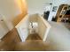 Well-lit staircase with carpeted steps leads to the upper level, connecting various living spaces at 2292 Hampton Dr, Franklin, IN 46131