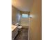 Bathroom with a shower and tub combination, and a single sink vanity and modern fixtures at 2354 Collier St, Indianapolis, IN 46241