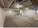 Spacious basement with new carpet, painted ceilings, and access to mechanicals, offering versatility at 2626 Fairhaven Dr, Indianapolis, IN 46229