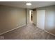 Inviting bedroom with plush carpet, a closet, and neutral walls at 2626 Fairhaven Dr, Indianapolis, IN 46229