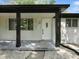 Inviting front porch featuring a modern design and well-maintained landscape, leading to the main entrance at 2853 S State Ave, Indianapolis, IN 46203