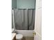 Bathroom featuring a bathtub with shower and door to the hallway at 2929 Tuscarora Ln, Indianapolis, IN 46217