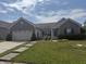 Charming single Gathering home with attached two car garage and a well maintained lawn at 2929 Tuscarora Ln, Indianapolis, IN 46217