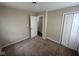 Bedroom featuring carpet flooring and double door closet at 3302 N Butler Ave, Indianapolis, IN 46218