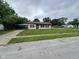 Charming single-story home with a chain-link fence and a convenient carport at 3302 N Butler Ave, Indianapolis, IN 46218
