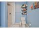 Bathroom featuring toilet, shower and storage for towels at 3350 Cessna Dr, Columbus, IN 47203
