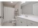 Bathroom with a large vanity, shower, and neutral color palette at 3350 Cessna Dr, Columbus, IN 47203