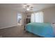 Bedroom featuring an ensuite bathroom and ceiling fan at 3350 Cessna Dr, Columbus, IN 47203