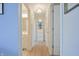Hallway leading to a bathroom and a storage room at 3350 Cessna Dr, Columbus, IN 47203