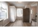 Eat-in kitchen featuring stainless steel refrigerator and natural light at 3350 Cessna Dr, Columbus, IN 47203