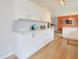 Bright kitchen with white cabinets, marble countertops, and an open floor plan at 3350 Cessna Dr, Columbus, IN 47203
