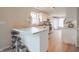 Modern kitchen featuring sleek white cabinets, stainless steel appliances, and ample counter space at 3350 Cessna Dr, Columbus, IN 47203