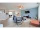 Bright and airy living room featuring modern furnishings, hardwood floors, and a ceiling fan at 3350 Cessna Dr, Columbus, IN 47203